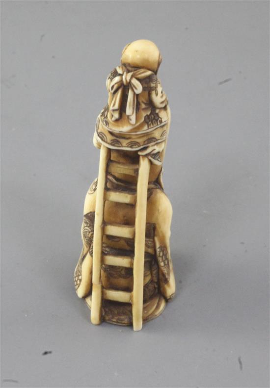 A Japanese ivory netsuke of Fukurokuju and a boy, 19th century, signed Minkoku, 6cm high (no.591)